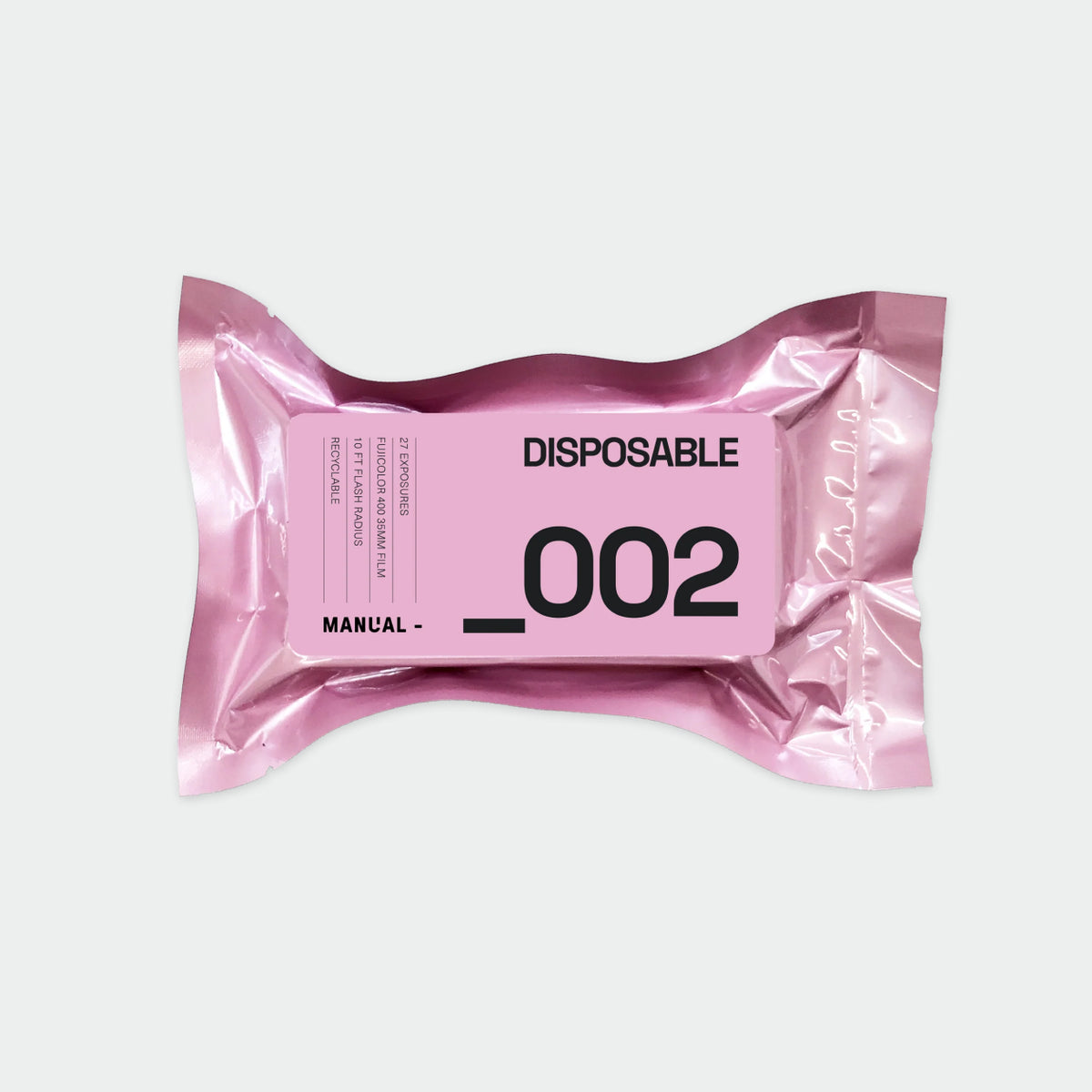 Manual _002 disposable camera in pastel pink foil packaging